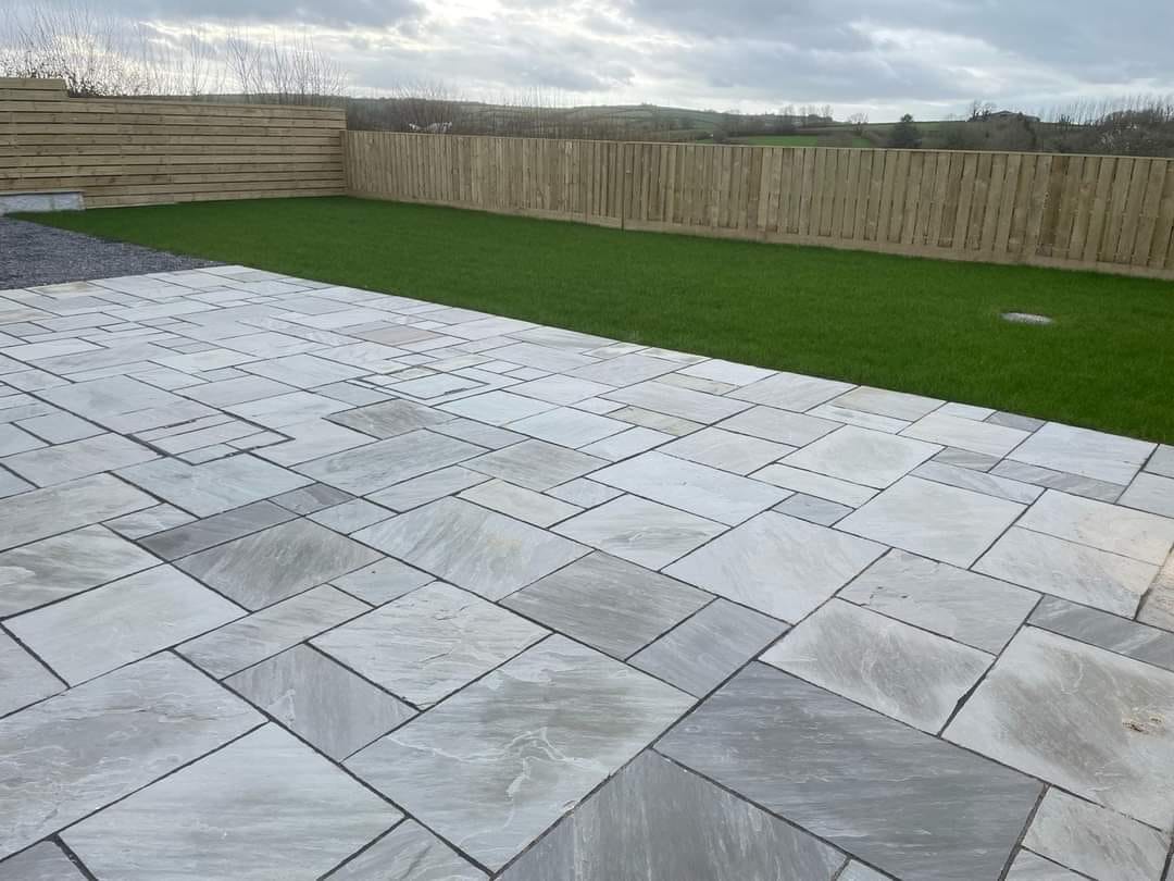 Natural stone garden patio installation in Teignmouth, Devon by Robins & Stone